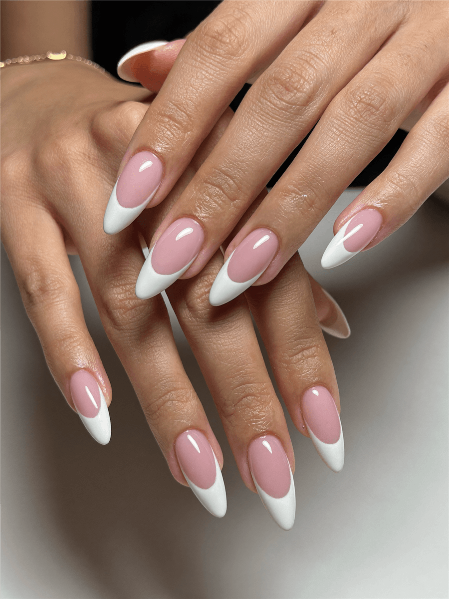 A classic French manicure previewed with Naura